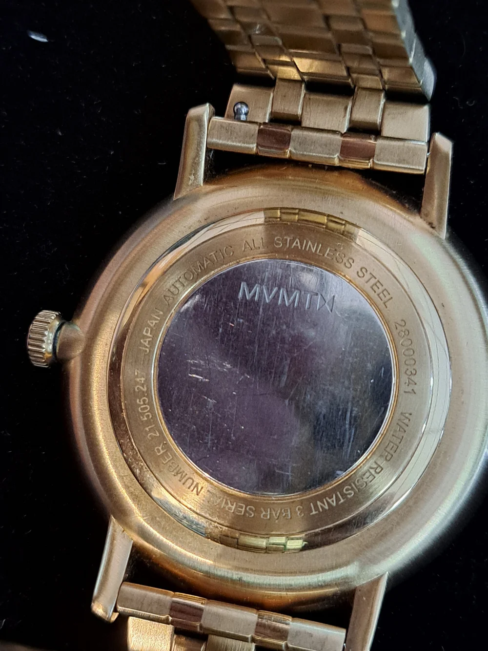MVMT Gold Bracelet Watch with Green Dial and Open Heart